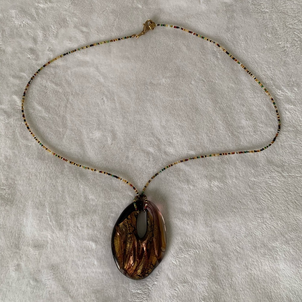 Glass medallion with beaded chain. **BOGO same or less$